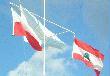 Trzy flagi a jake wymowne, flaga Polski, Libanu i Organizacji Narodw Zjednoczonych 