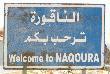 Ten znak drogowy informuje , e wkraczamy do strefy przygranicznej do miejscowoci Naqoura w ktrej znajduje si gwny obz UNIFIL