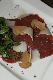 Carpaccio z jelenia. Z parmezanem i rukol. 